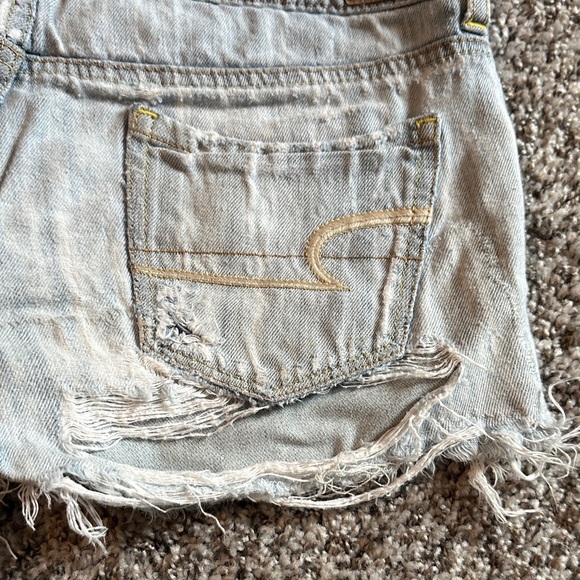 American Eagle Outfitters Light Wash Distressed Denim Cutoff Shorts - Picture 5 of 8